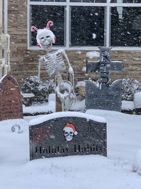 Building and setting up the Holiday Habits cemetery display during the 2022 season