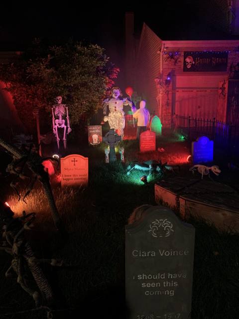 The Holiday Habits Halloween yard haunt lit up on Halloween night in 2022, Huntley, Illinois