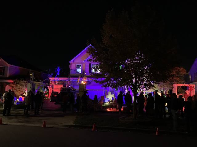 The Holiday Habits Halloween yard haunt lit up on Halloween night in 2022, Huntley, Illinois