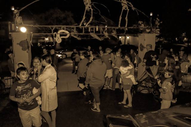 Scare actors in costume and makeup during a Holiday Habits scare night in 2017