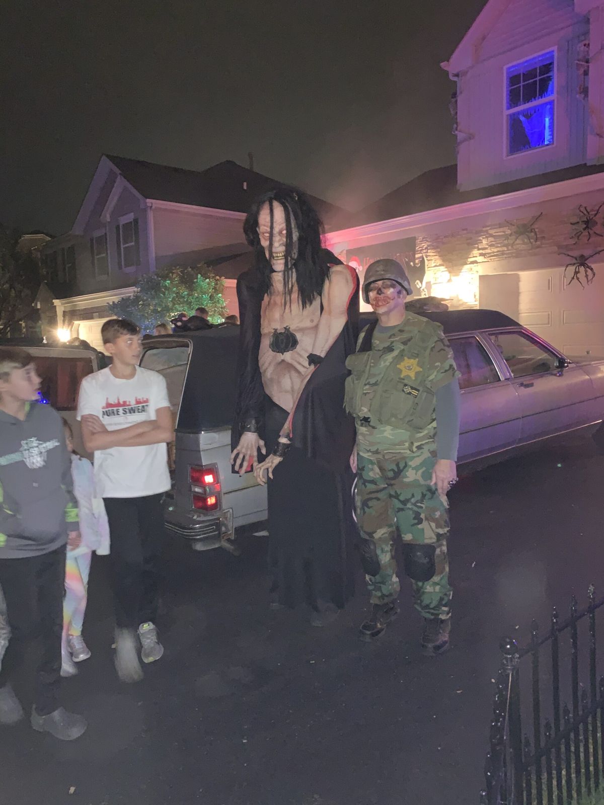 The Holiday Habits Halloween yard haunt lit up on Halloween night in 2022, Huntley, Illinois