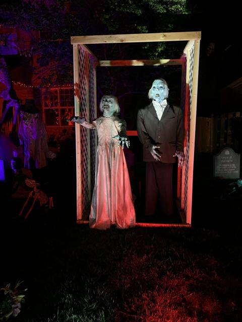 The Holiday Habits Halloween yard haunt lit up on Halloween night in 2022, Huntley, Illinois