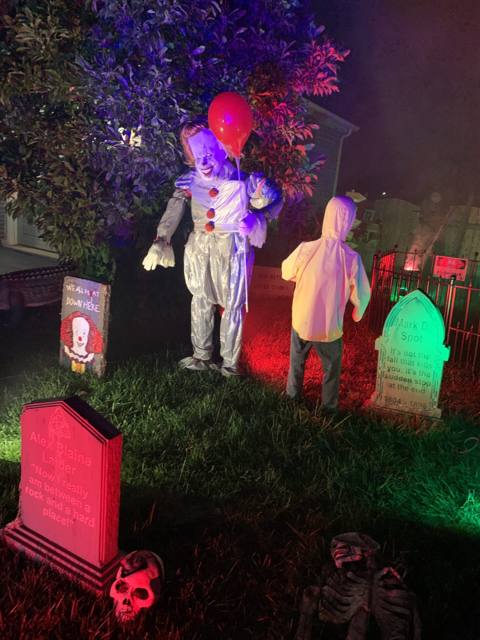 The Holiday Habits Halloween yard haunt lit up on Halloween night in 2022, Huntley, Illinois