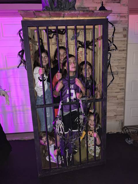 The Holiday Habits Halloween yard haunt lit up on Halloween night in 2022, Huntley, Illinois