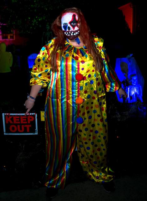 Scare actors in costume and makeup during a Holiday Habits scare night in 2017