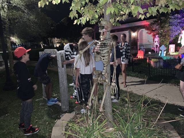 The Holiday Habits Halloween yard haunt lit up on Halloween night in 2022, Huntley, Illinois
