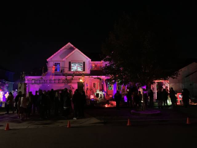 The Holiday Habits Halloween yard haunt lit up on Halloween night in 2022, Huntley, Illinois