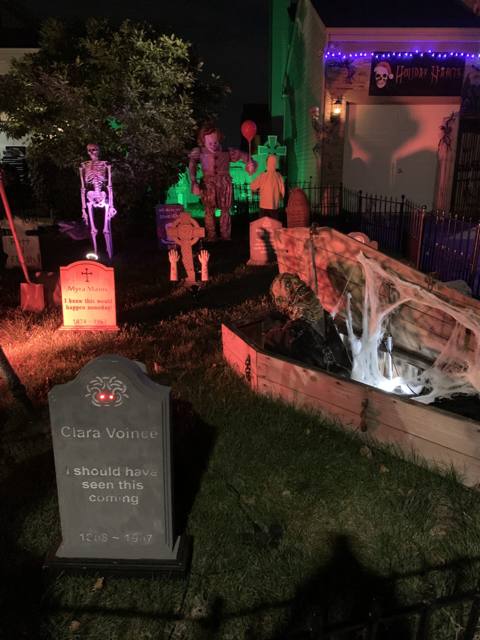 The Holiday Habits Halloween yard haunt lit up on Halloween night in 2022, Huntley, Illinois